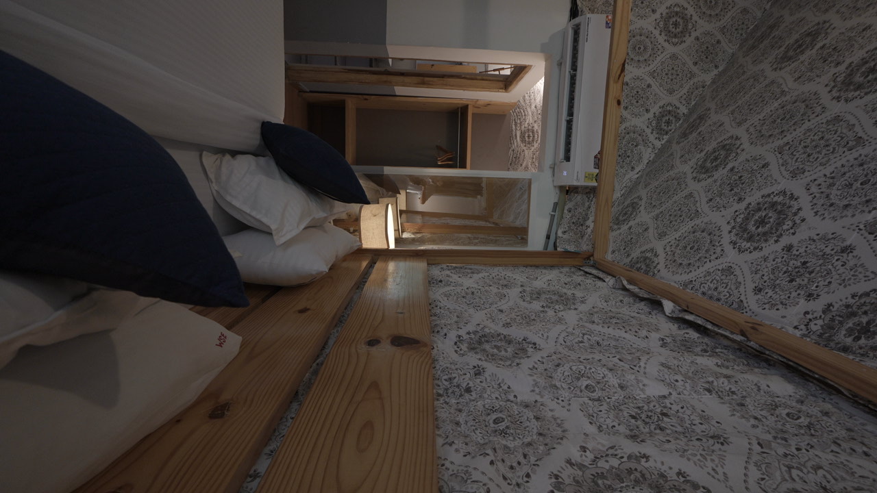 Bedside details and patterned interior of a Maldevta Farms cottage